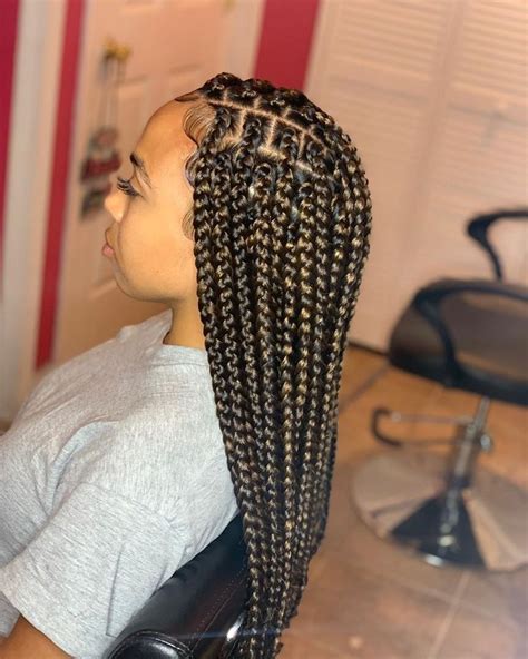 This style is a tension free braided hairstyle with hair added through out the natural hair. . Hair salons near me that do box braids